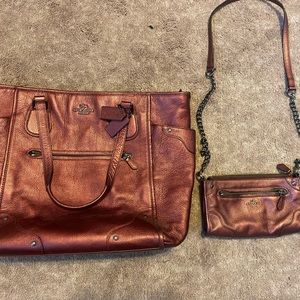 Coach purse and matching wristlet/ chain.Metallica purple color. Gently used.